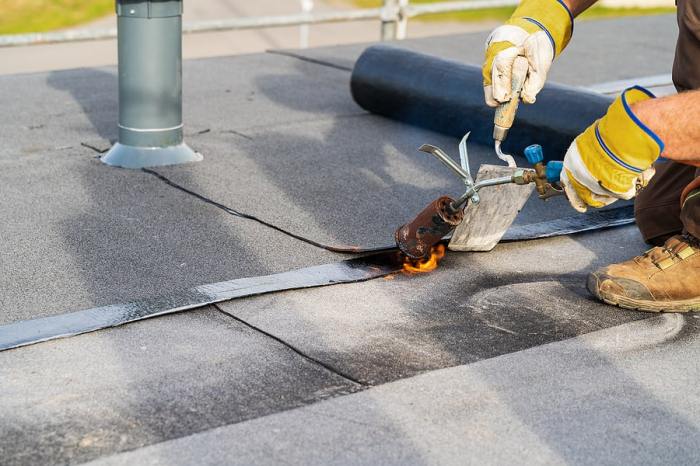 What to Do If You Have a Flat Roof Leak (Common Causes)